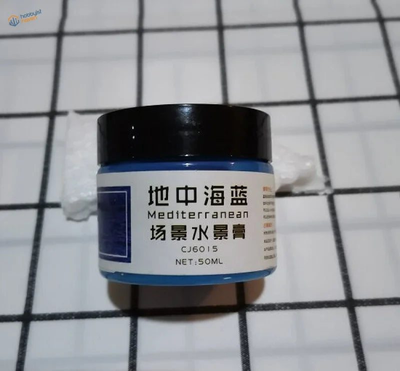 Water simulating paste jar with Mediterranean scene cream label