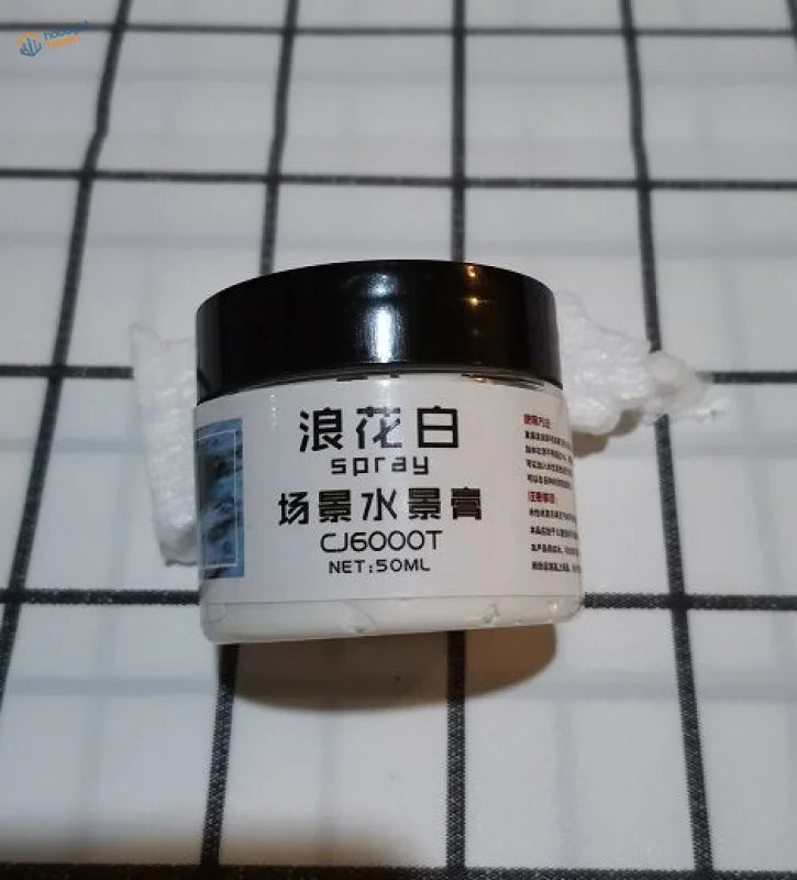Water simulating paste: 50ml white jar with black lid labeled 浪花白 spray 场景水景膏