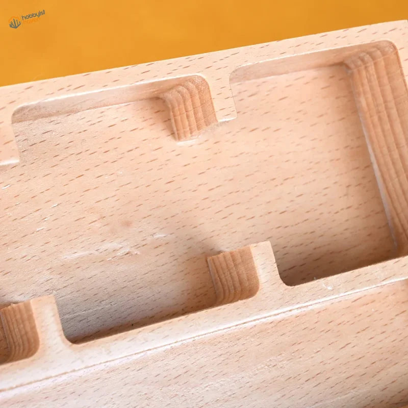 Light wood base tray with carved compartments for panel liner scale modeling tools