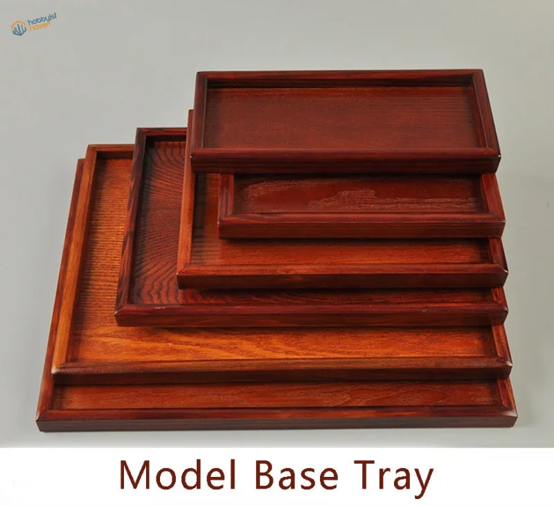 Set of five polished reddish-brown wooden bases for dioramas