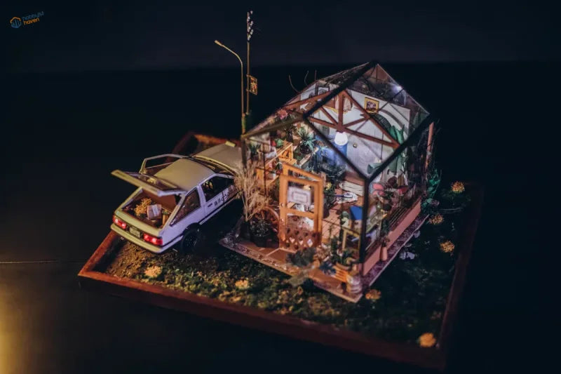Miniature glass greenhouse on wooden bases for scale modeling tools