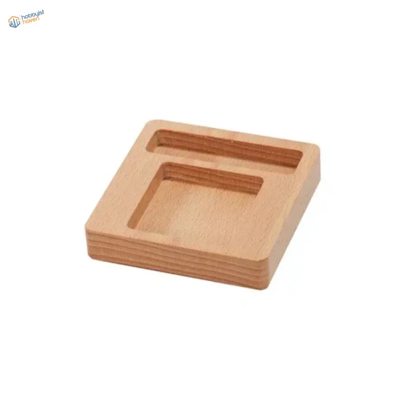 Light brown wooden glue holder coaster with two recessed compartments