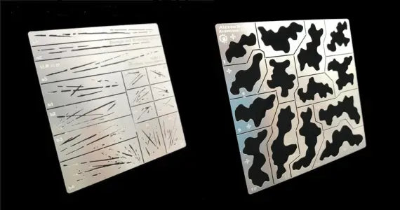 Silver metal stencil sheets with intricate line patterns and black silhouette cutouts for precision hobby tools