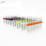 Colorful 0.1-2.0mm carbide micro drill bits in clear plastic holders