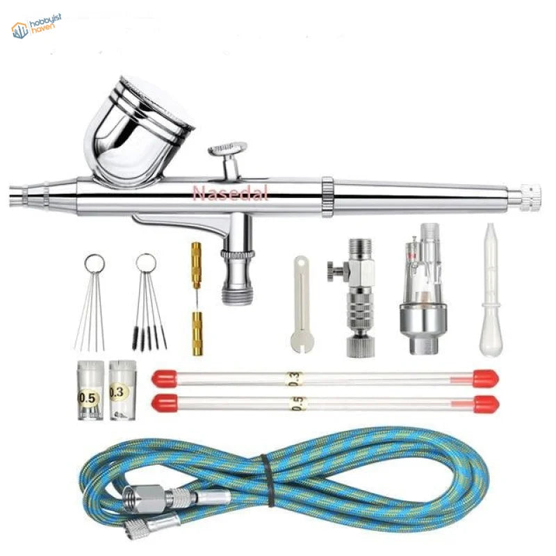 Silver nosed dual action airbrush with chrome finish and accessories