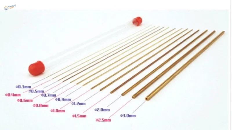 Set of 0.3-1.5 mm brass tubes with red caps for scale modeling tools
