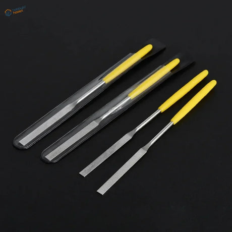 Four ultra fine diamond flat file chisels in clear cases