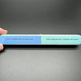 A two-sided 7-sided polishing rod with blue coarse grit and light green medium grit to remove mold lines and shape nails
