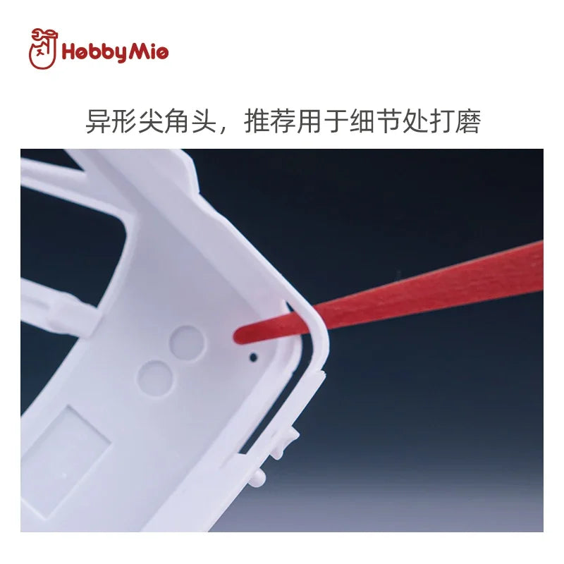Pointed-tip Hobby Mio sanding stick reaching a corner of a plastic part