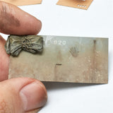 Miniature olive-green paw print stencil bundle with handprints on 920 plaque