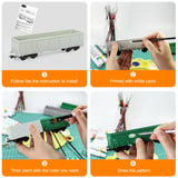 Ho scale 1:87 green painted high-side gondola wagon plastic model being detailed with fine scale modeling tools