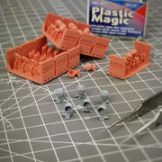 Orange plastic train containers with figures near 1/35 Bosch lamps for Panzers