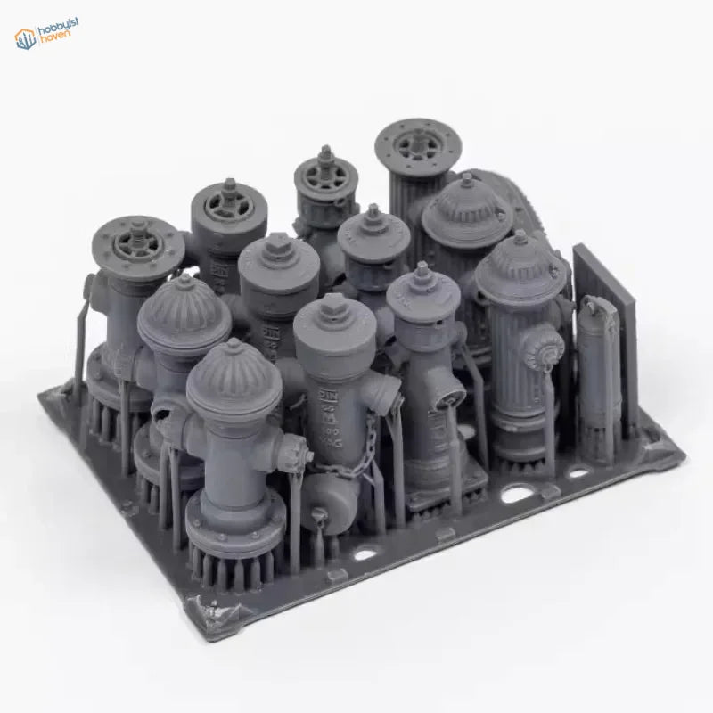 Gray 3D-printed miniature fire hydrants on base for 1/35 scale modeling