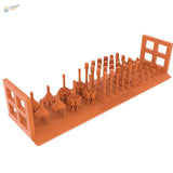 Orange plastic 3D-printed German grenade models in 1/35 WWII workshop scene