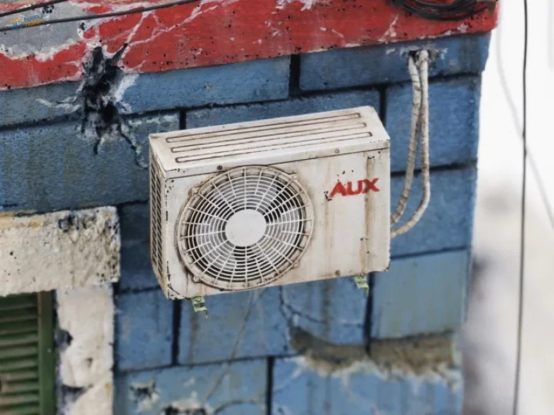 1/35 weathered white Aux air conditioner unit on blue brick wall