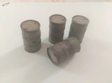 Four 1/35 resin 200L barrels: one on side, three upright