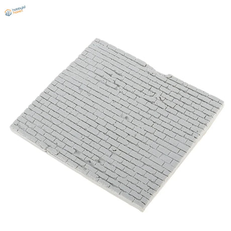Gray resin brick wall panel in 1/35 scale with brick pattern