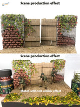 1/35 scale soldiers by ivy-covered gate with miniature tree leaves