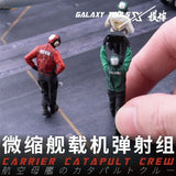 Red and green 1/48 flight deck crew figurines with helmets