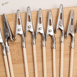 Silver alligator clips with wooden handles, scale modeling tools