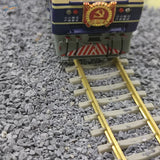 100g ballast gravel bag with blue cream train on golden tracks