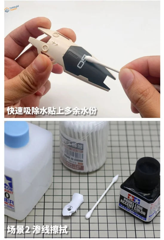 Cotton swab removing adhesive residue from black beige model airplane part