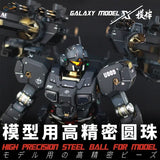 Black and gold Galaxy Model X robot with stainless steel armor for scale modeling and paint mixing balls
