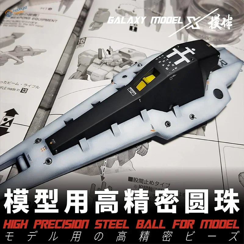 Black and white scale modeling plane with yellow accents for paint mixing