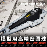 Black and white scale modeling plane with yellow accents for paint mixing