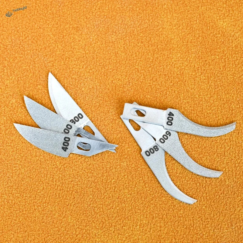 Set of silver-colored metal file blades with engraved grit levels for 100Shiki sickle-shaped curved emery file use