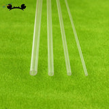10pcs 2-6mm transparent plexiglass tubes on green textured surface