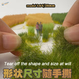 Miniature diorama with 12mm static grass tufts on grassy fields