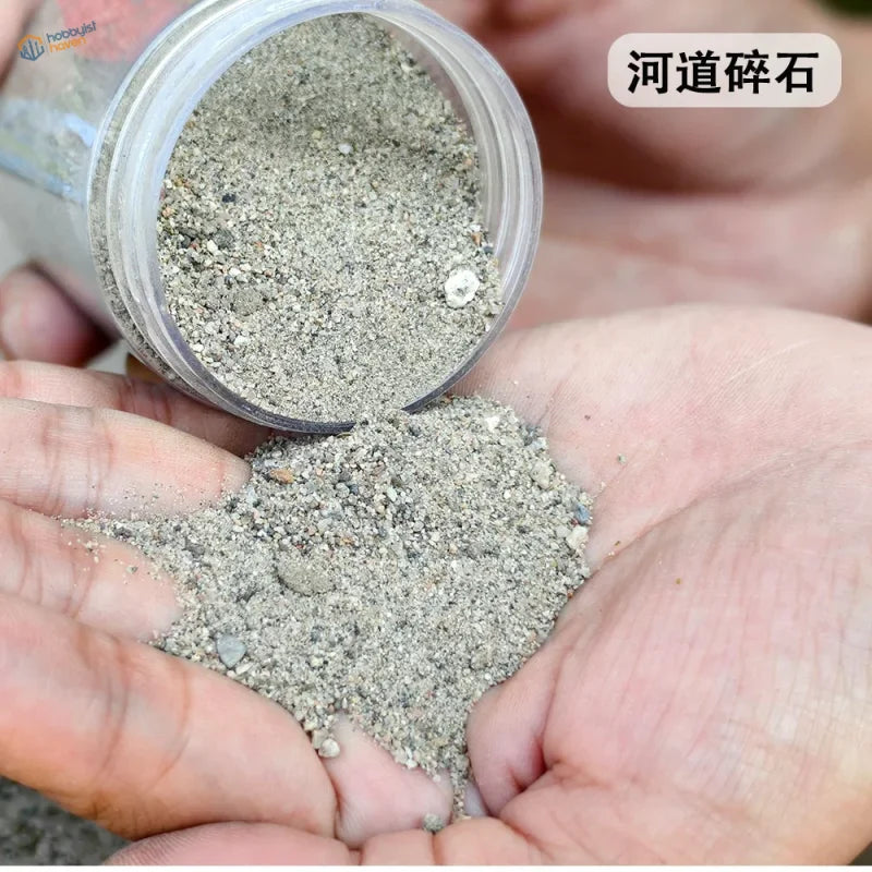 140ml HO/N railway ballast: gray gravel poured into cupped hands for scale modeling
