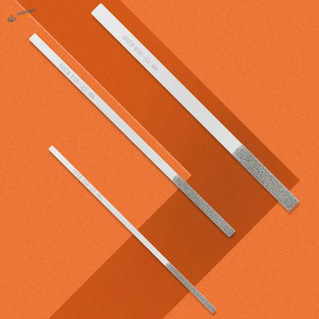 Three tapered metal files with handles for scale modeling