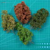 Four 15cm dense tree models with mossy green foliage for scale modeling tools