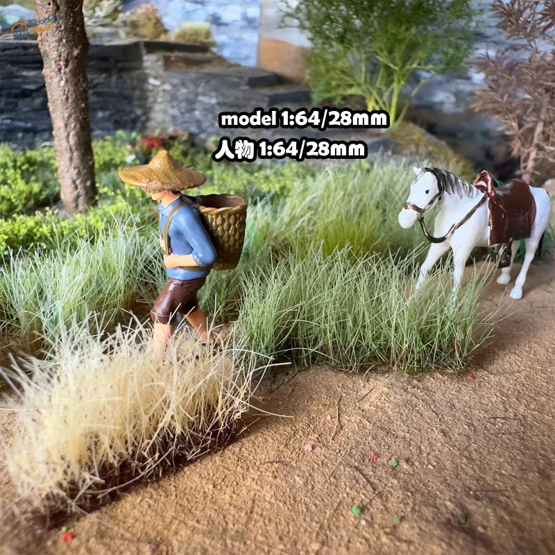 16mm static grass tufts with 1:64 farmer figurine in straw hat and blue shirt