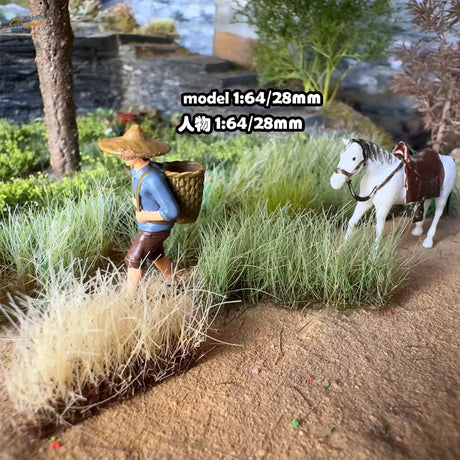 16mm static grass tufts with 1:64 farmer figurine in straw hat and blue shirt