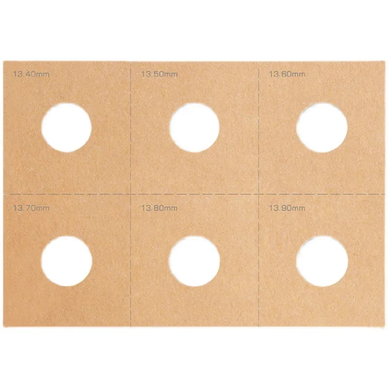 Brown coin sheet with labeled cutouts for airbrush stencils model painting