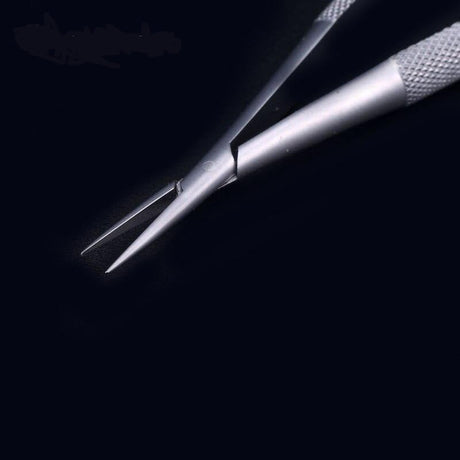 Silver precision tweezers with textured grips for photo-etched scale modeling parts