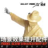 Beige 1/35 scale model man in fedora with extended arm for precision hobby tools
