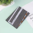Gray notebook with realistic runway base design in white orange stripes