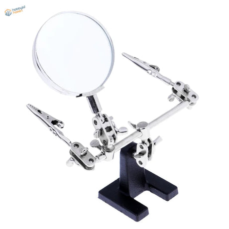 Silver-toned 2.5x magnifying glass with alligator clips for soldering scale modeling