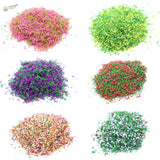 Six 20g flowery tree powder piles of pink green dried miniature flower grasses