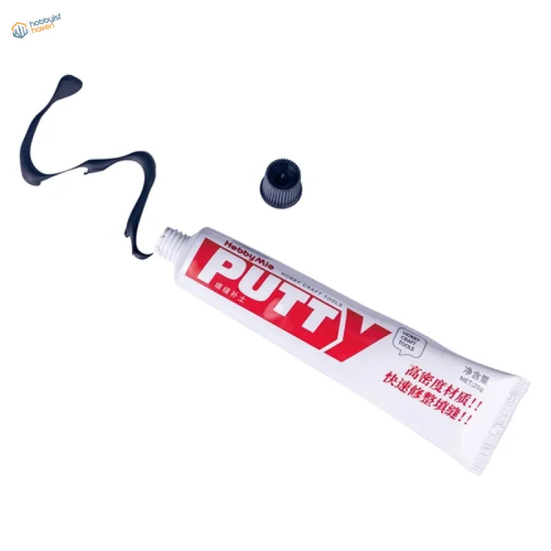 20g quick-drying putty tube in white with black cap, red lettering, dark adhesive squeezed out
