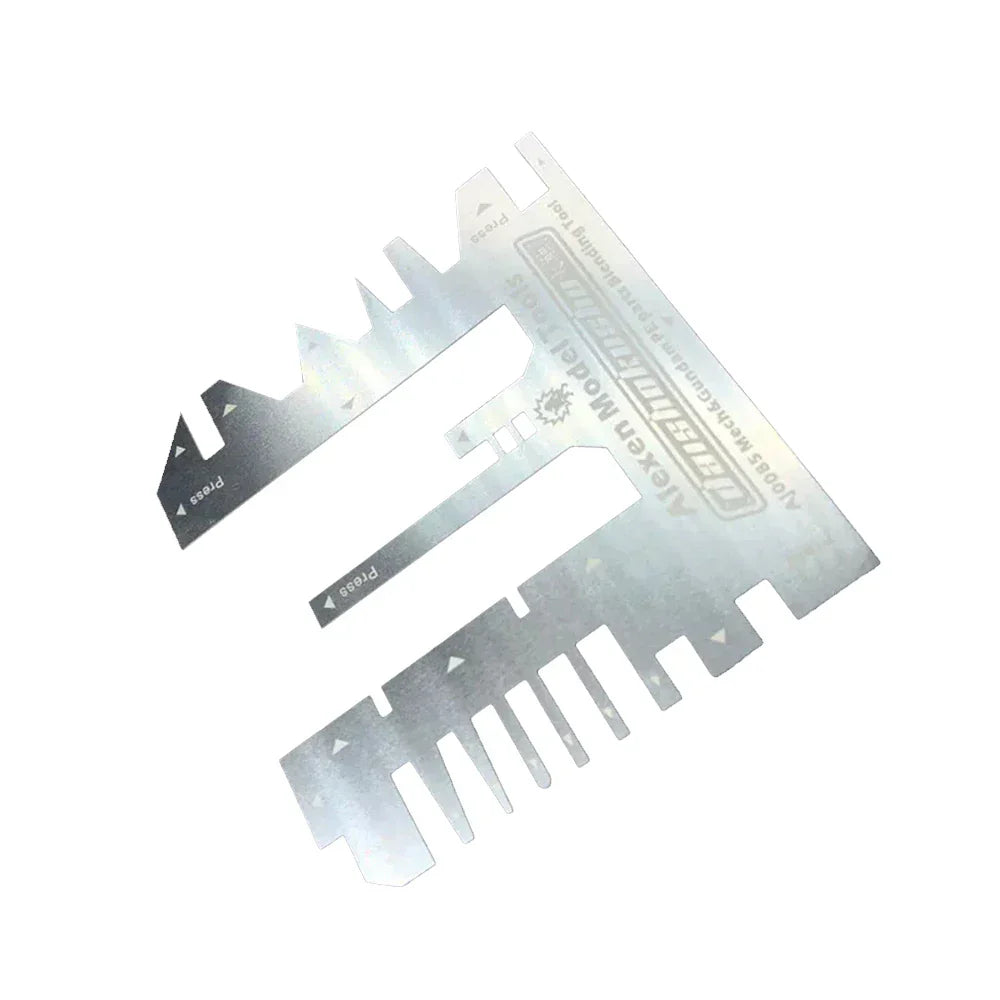 Silver photo etch bending tool with serrated edges and ruler