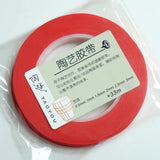 Red adhesive fine line masking tape roll with chinese label in clear plastic for scale modeling tools and model building tools