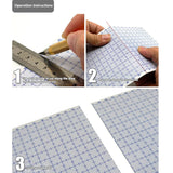 Blue abs plastic modeling sheets with white grid markings and dotted crosshairs for precise crafting on cutting mat