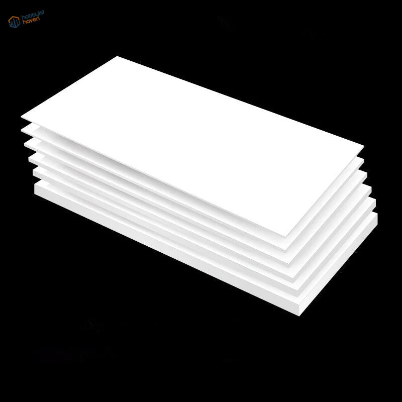 Stack of white 100x200mm styrene sheets for scale models