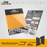Orange translucent Legimaster carving guide sheets in black white packaging