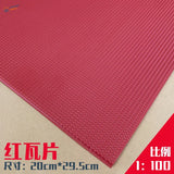 Red rubber mat with textured grid on roof simulating PVC panel